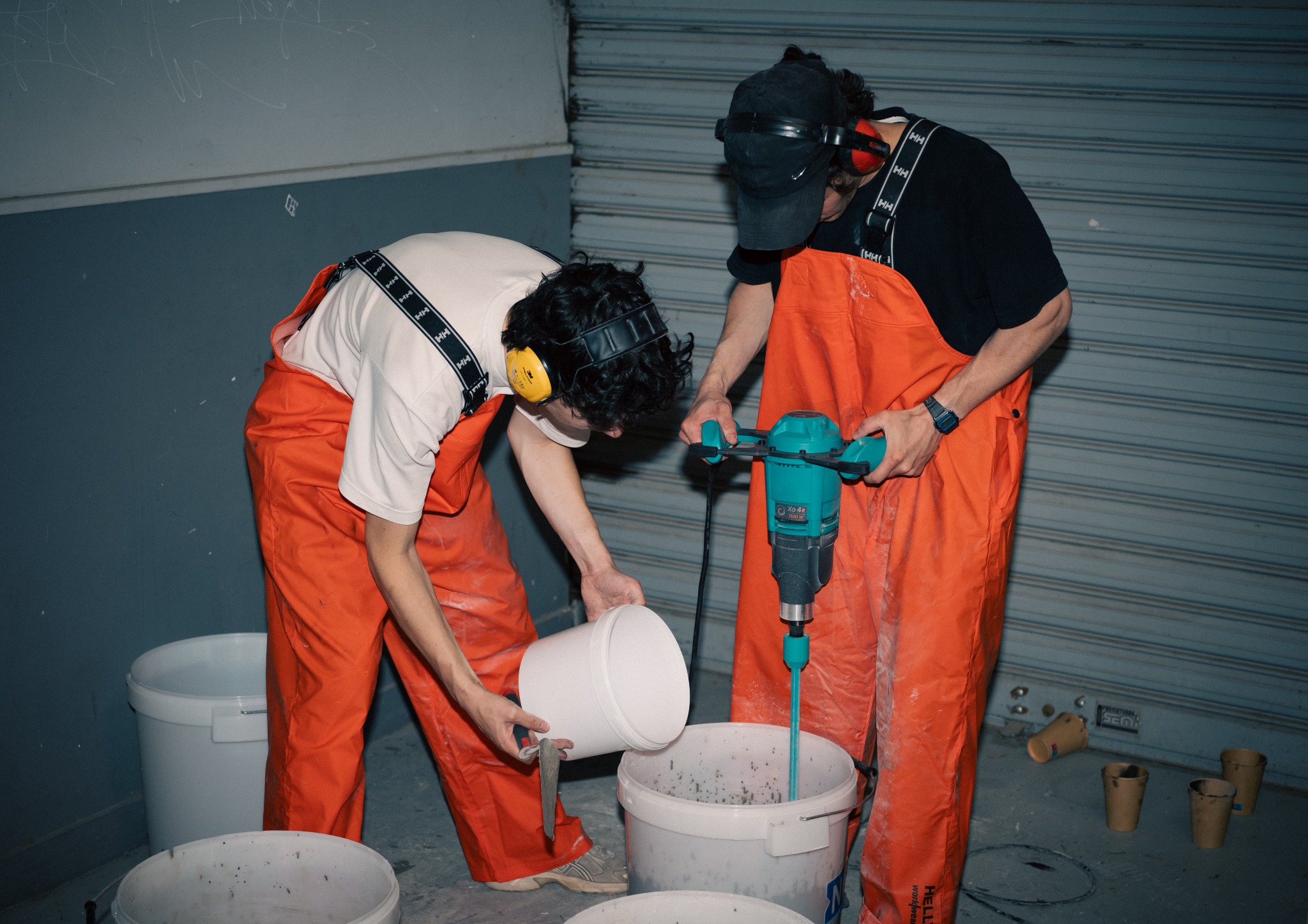 Mixing concrete by hand in the workshop